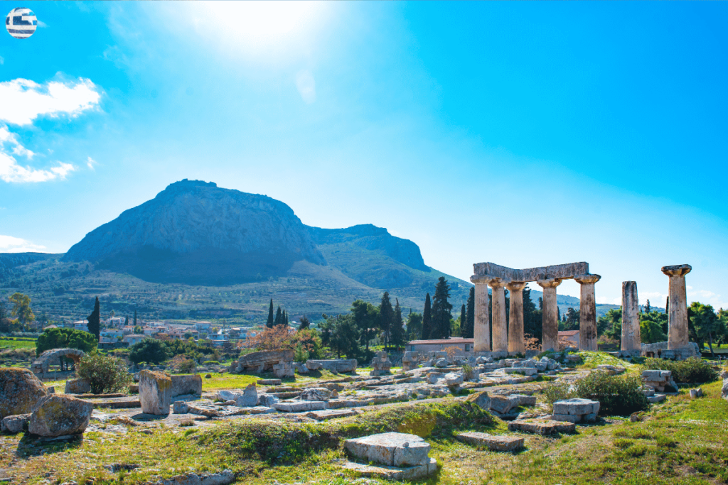 Greek ruins standing with mountain on thee background